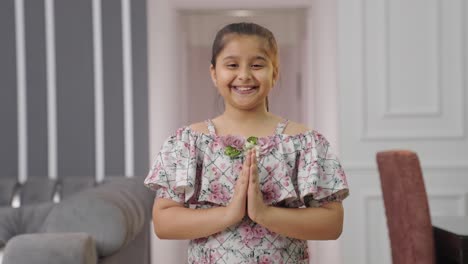 Indian-kid-girl-doing-Namaste-and-greeting