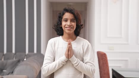 Polite-Indian-boy-kid-doing-Namaste-and-greetings