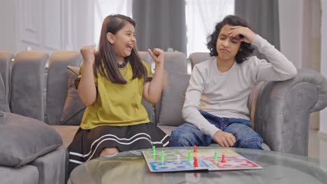 Indian-kid-girl-wins-the-Ludo-match-and-makes-fun-of-brother