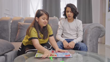 Indian-girl-kid-scraps-the-Ludo-game-when-brother-is-about-to-win
