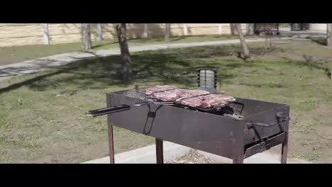 Meat-grilled-on-the-grid.-Food-for-barbecue-party.-Tasty-grilled-food.-Meat-on-a-grill.-shot-in-4k