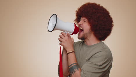 Smiling-bearded-man-talking-with-megaphone,-proclaiming-news,-loudly-announcing-sale-advertisement