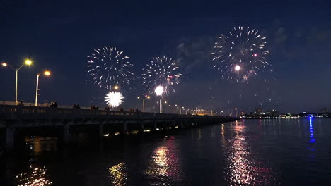 A-fireworks-display-over-water-marks-a-big-holiday-2