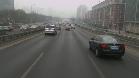 Taxis-and-vehicles-travel-along-busy-roads-in-China-1