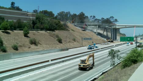 Pan-left-to-right-over-an-empty-stretch-of-the-405-freeway-in-Los-Angles-as-crews-tear-down-part-of-a-bridge