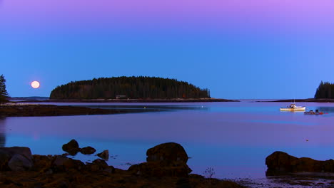 A-beautiful-evening-shot-along-the-Maine-or-New-England-coast-with-moon-rising