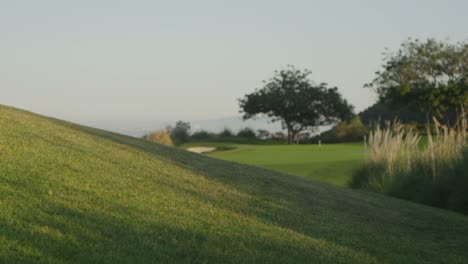 Wide-shot-from-a-hill-over-looking-a-golf-course