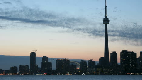 The-Toronto-skyline-brightens-as-the-colorful-sky-darkens