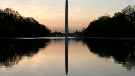 The-Washington-Monument-is-silhouetted-against-a-colorful-sky-in-Washington-DC-3
