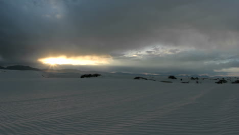 The-sun-lends-a-fiery-golden-glow-on-the-horizon-of-White-Sands-National-Monument-gradually-fading-into-night
