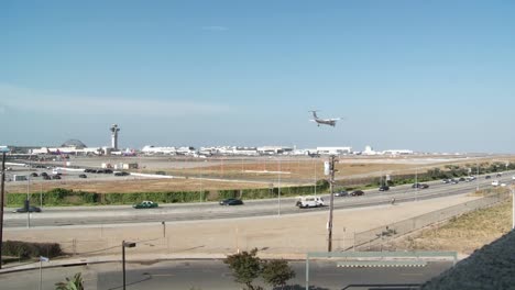 A-Wide-Shot-Of-Planes-Take-Off-And-Taxi-At-Los-Angeles-International-Airport