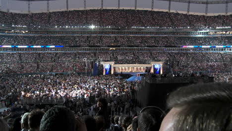 Spot-Lights-Illuminated-A-Packed-Investco-Field-As-Presidential-Nominee-Barack-Obama-Delivers-His-Acceptance-Speech-During-The-Final-Night-Of-The-2008-Democratic-National-Convention-In-Denver-Colorado