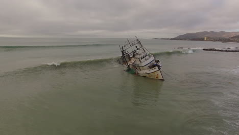Aerial-Shot-Over-A-Shipwrecked-Fishing-Boat-Near-Ventura-California-1