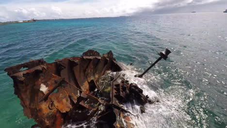 Aerial-over-a-rusting-shipwreck-in-the-harbor-of-Tuvalu