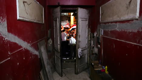A-doorway-frames-protestors-in-Cairo-Egypt