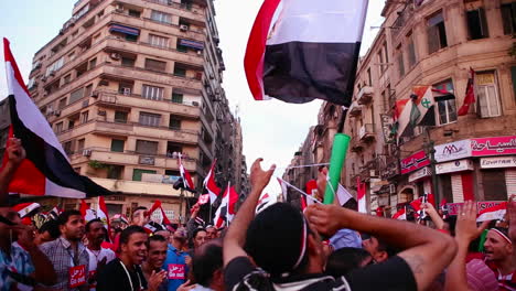 Protestors-chant-and-wave-flags-in-Cairo-Egypt