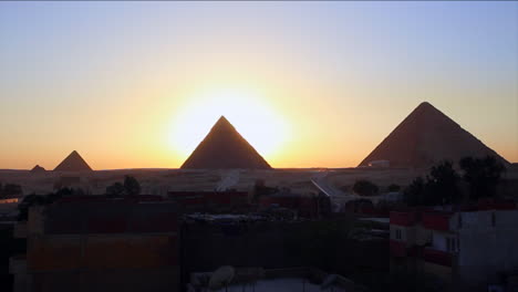 Sunrise-behind-the-great-pyramids-of-Giza-1