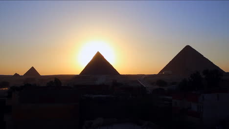 Sunrise-behind-the-great-pyramids-of-Giza-2