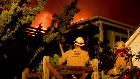 A-Firefighter-Tries-To-Save-A-Burning-House-During-The-Holiday-Fire-In-Goleta-California