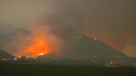 The-Thomas-Fire-Burns-At-Night-In-The-Hills-Above-The-101-Freeway-Near-Ventura-And-Santa-Barbara-California-1