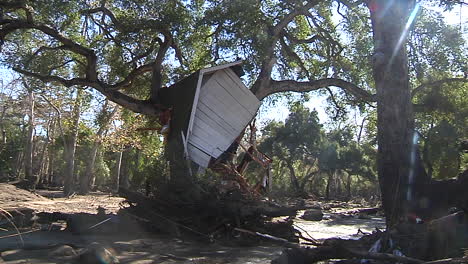 Part-Of-A-House-Is-Lieft-In-A-Tree-The-Damage-From-The-Mudslides-In-Montecito-California-Following-The-Thomas-Fire-Disaster