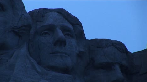 Thomas-Jefferson-Is-Flanked-By-George-Washington-On-His-Left-And-Theodore-Roosevelt-On-His-Right-In-This-Extreme-Closeup-Detail-Of-Mt-Rushmore
