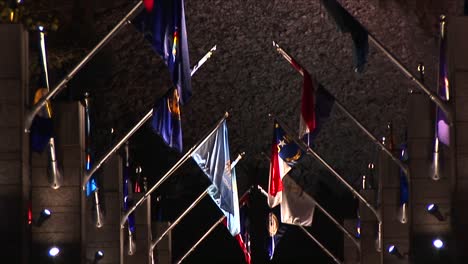 The-Camera-Pans-Up-The-Avenue-Of-Flags-To-Mt-Rushmore-At-Night-In-Lights
