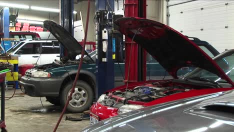 Mediumshot-Of-Cars-In-A-Repair-Shop