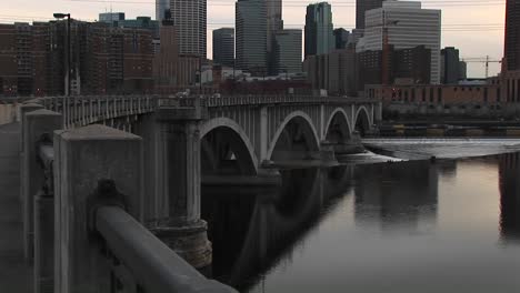 Panup-From-Bridge-On-Mississippi-River-To-Skyline-Of-Minneapolis-Minnesota