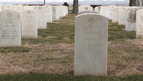 The-Camera-Pans-Left-Across-Rows-Of-White-Marble-Headstones-In-Arlington-National-Cemetery