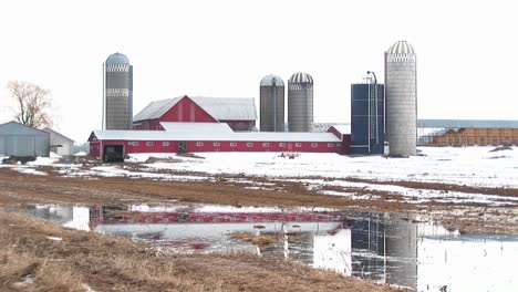 Longshot-Of-Farm-Barns-And-Silos-On-A-Winter\'S-Day