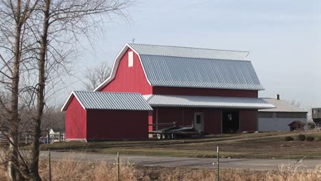 This-Bright-Red-Barn-Stands-Out-On-This-Rather-Cloudy-Winter-Day