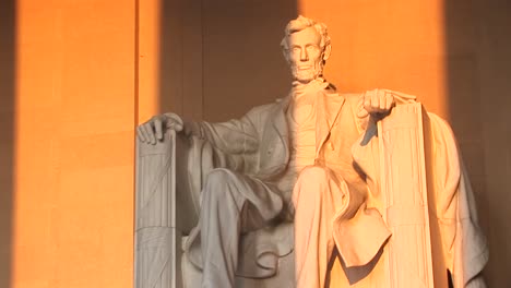 Columns-Of-The-Lincoln-Memorial-Building-Cast-Long-Shadows-On-The-Statue-Seen-Inside-1