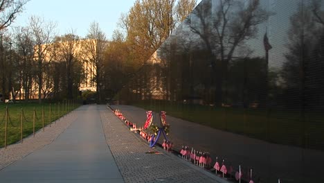 In-Front-Of-The-Vietnam-Veterans-Memorial-Wall-Ribbons-On-Tributes-And-Mementos-Flutter-In-The-Breeze-1