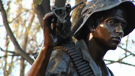 Panright-To-A-Closeup-Of-The-Faces-Of-The-Three-Soldiers-Sculpture-In-Washington-Dc