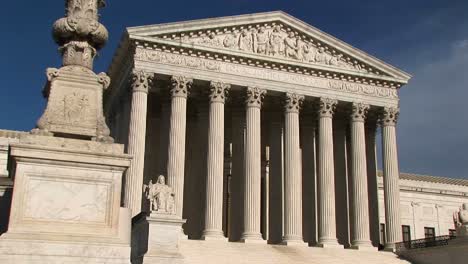 Warm-Sunlight-Shines-On-The-White-Stone-Steps-And-Bright-White-Pillars-Of-The-Us-Supreme-Court-Building-Entrance