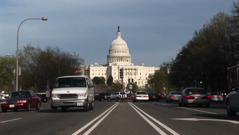 View-Tracksin-On-The-United-States-Capitol-Building-In-The-Background-Of-Streets-Flowing-With-Traffic