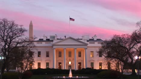 Pale-Pink-And-Blue-Streaks-Form-A-Colorful-Backdrop-Behind-The-White-House