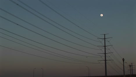 Longshot-The-Full-Moon-Hanging-Above-Power-Lines