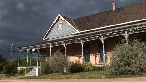 Mediumshot-Of-A-Ranch-House-As-Storm-Clouds-Gather-Behind-It