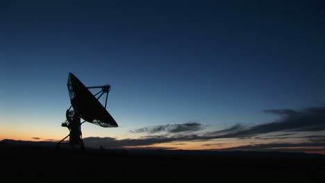Longshot-Of-A-Silhouette-Of-A-Satellite-Dish-In-The-Array-At-The-National-Radio-Astronomy-Observatory-In-New-Mexico