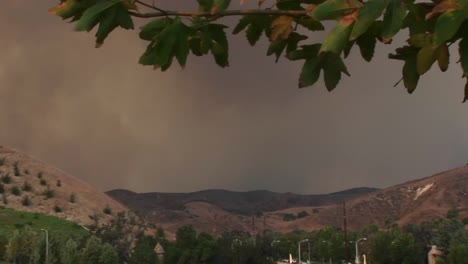 Panleft-Shot-Of-Smoke-Billowing-From-A-Wild-Fire-Raging-Near-A-Southern-California-Community