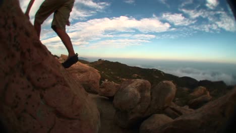 Fisheye-Of-A-Young-Hiker-Hopping-From-Boulder-To-Boulder-In-The-Santa-Barbara-Mountains