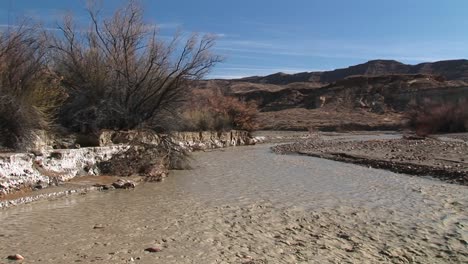 Mediumshot-Of-A-Stream-Flowing-Through-Death-Valley-California