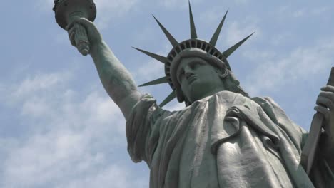 Time-Lapse-Tilt-Up-Of-Clouds-Behind-The-Statue-Of-Liberty-In-This-Shot-Which-Says-Patriotism-And-Patriotic-Values