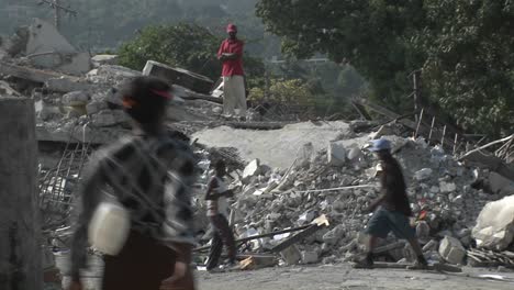 People-sift-through-the-rubble-following-the-Haiti-earthquake