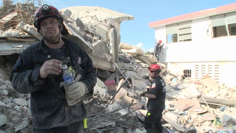 Rescue-workers-search-among-piles-of-rubble-after-the-Haiti-earthquake-2