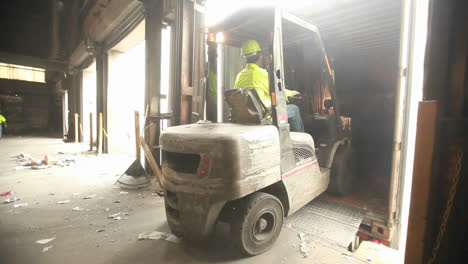 Skip-loaders-move-aluminum-blocks-at-a-recycling-center-1