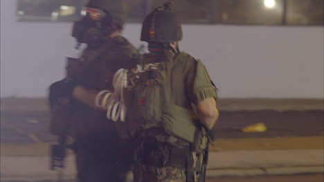 Police-in-heavy-military-gear-prepare-to-confront-protestors-in-Ferguson-Missouri-2
