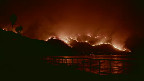 Spectacular-view-of-California-hillsides-on-fire-beside-the-ocean-during-the-Thomas-Fire